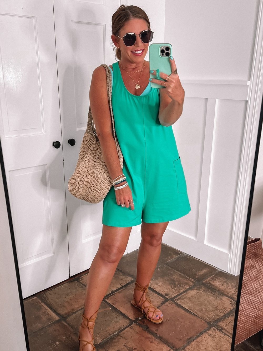 NWOT Amazon Women's Sleeveless Teal Romper, size medium